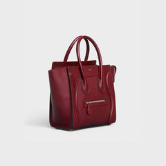 Micro Luggage Handbag In Drummed Calfskin Light Burgundy