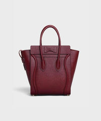 Micro Luggage Handbag In Drummed Calfskin Light Burgundy