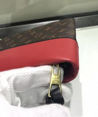 LV Pochette Tuileries Monogram Coated Canvas Red