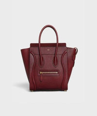 Micro Luggage Handbag In Drummed Calfskin Light Burgundy